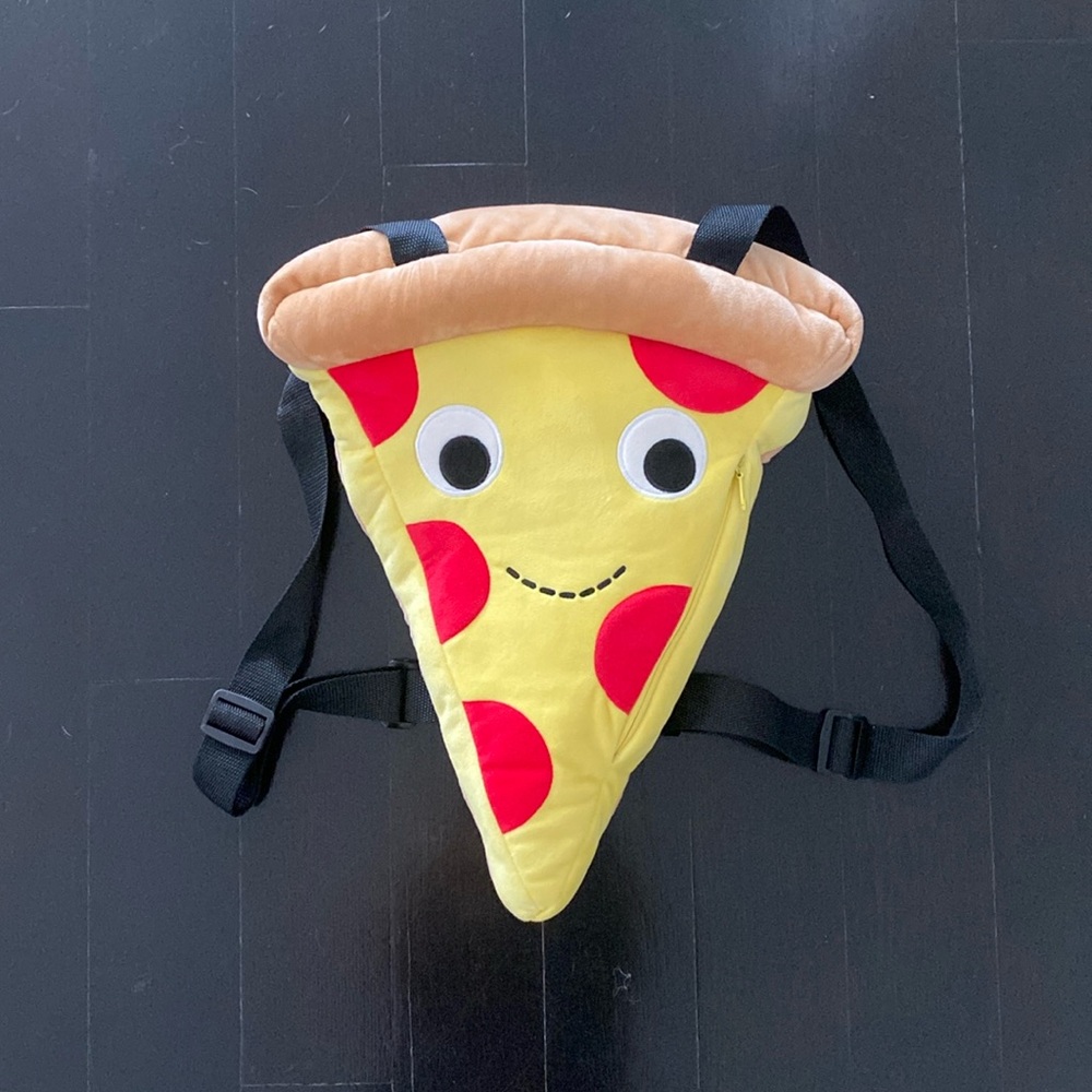 Cute pizza plush backpack with waterproof liner. 15x12”. Never used